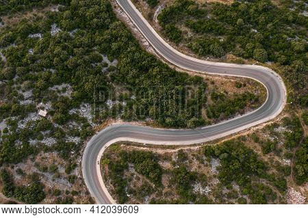 Aerial Drone Shot Of Asphalt Road On Lapad Hill In Dubrovnink In Croatia Summer Time At Dusk