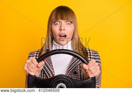 Photo Of Frightened Pretty Lady Arms Hold Steer Open Mouth Staring Camera Isolated On Yellow Color B