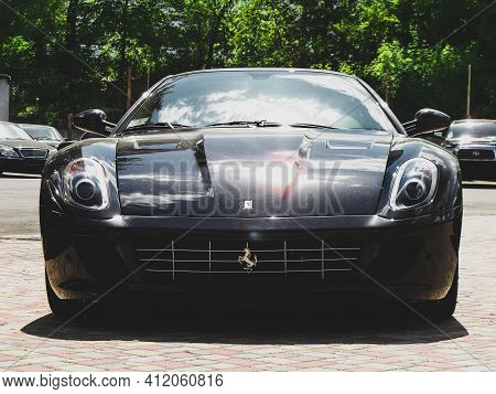 Kiev, Ukraine - May 14, 2011: Black Supercar Ferrari 599 Gtb Fiorano In The City