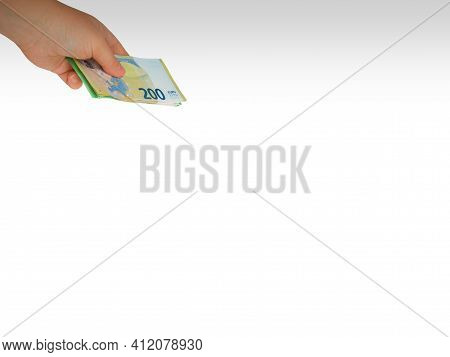 Closeup Hand Extended From Top To Bottom,giving Money,two,one Hundred Euro Bill Wad,white Background
