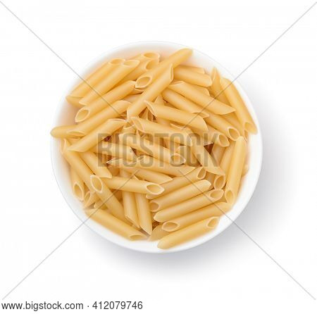 Top view of uncooked penne lisce pasta in bowl isolated on white