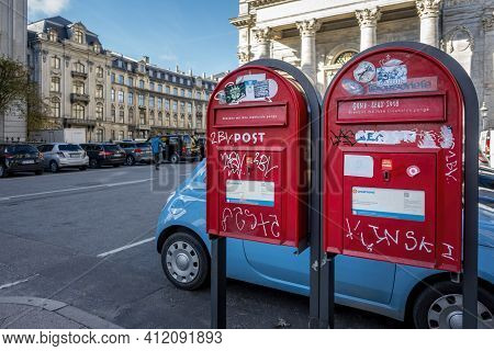 Copenhagen, Denmark - Oct 19, 2018: Mail Boxes Belonging To Post Danmark (postnord) Along A Suburban