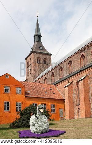 Odense Flower Festival  With St. Canute's Cathedral In Odense, Denmark