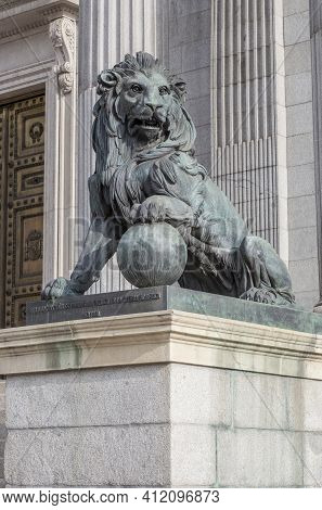 Madrid, Spain - March 6th, 2021: Spanish Congress Of Deputies Building. Lion. Neoclassical Palace Al