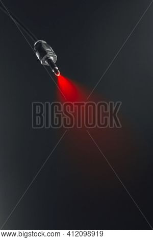 digital out optical audio cable connector, red led light in fog