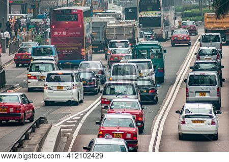 Hong Kong Island, China - May 14, 2010: Traffic On North Side With Multilane Lines Of Cars, Trucks, 