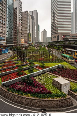 Hong Kong Island, China - May 14, 2010: Plants And Flowers On Roundabout At Rumsey-connaught Place W