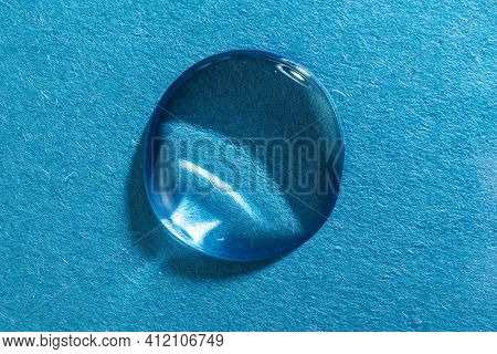 The Gel Flows Over A Blue Fluted Background