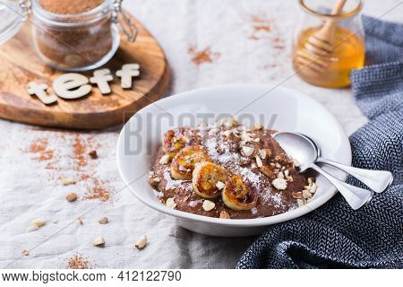 Teff Grain Porridge With Banana Topping For Breakfast