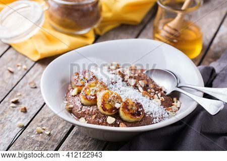 Teff Grain Porridge With Banana Topping For Breakfast