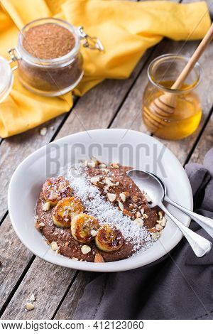 Teff Grain Porridge With Banana Topping For Breakfast