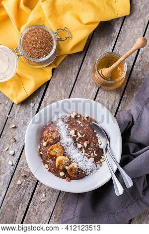 Teff Grain Porridge With Banana Topping For Breakfast