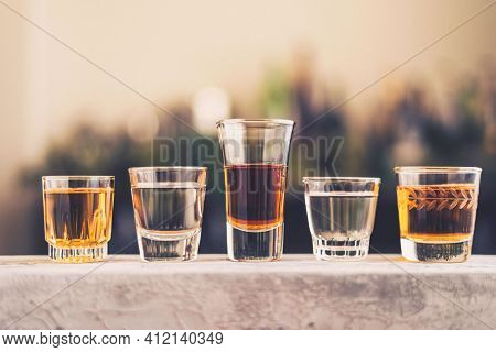 Hard Strong Alcoholic Drinks Big Glasses And Shot Glass In Assortent: Vodka, Cognac, Tequila, Brandy