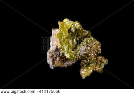 Macro Pyromorphite Mineral Stone On A Black Background Close Up