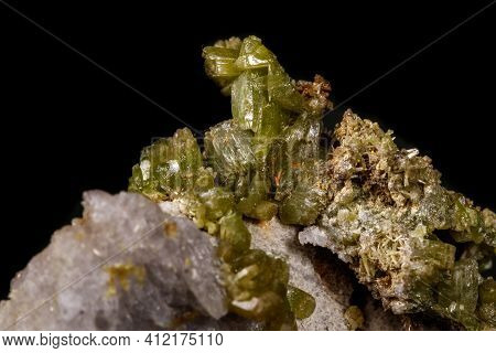 Macro Pyromorphite Mineral Stone On A Black Background
