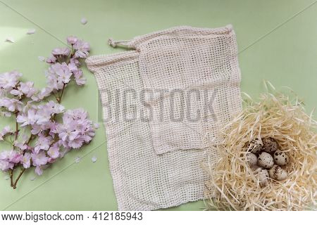 Cherry Blossom Branches, Textile Fruit Bags, Pink Flowers, Bird Nest With Quail Eggs On Light Green 