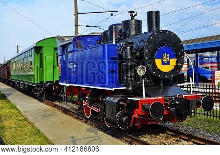 Retro Steam Locomotive Stands At The Station