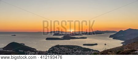 Panoramic View Of Tourists Adrmire Adriatic Islands With Dubrovnik Old Town In Sunset Hour From Top 