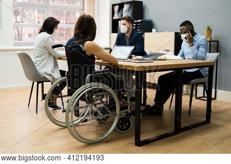 Diverse Disabled Business Worker People In Wheelchair Wearing Face Mask