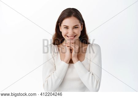 Impressed Fascinated Caucasian Emotive Enthusiastic Girl, Smiling Astonished, Hold Hands Face-line, 
