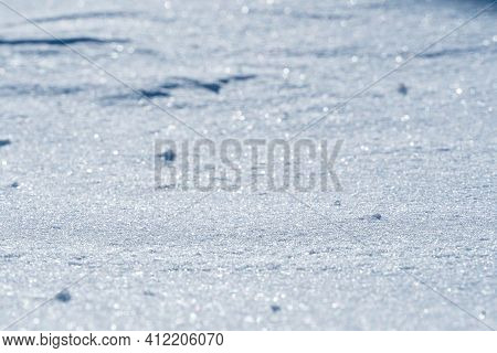 Snow Background. Lots Of Frozen Snowflakes In Daylight In Winter. Frozen Frozen Snowdrift.