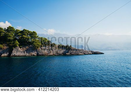 View On Grey Rock Islend In The Sea. Budva Riviera, Montenegro