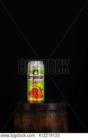 Can Of Bergenbier Beer On Beer Barrel With Dark Background. Illustrative Editorial Photo Bucharest, 