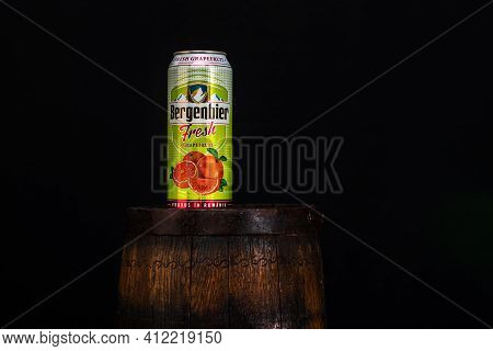 Can Of Bergenbier Beer On Beer Barrel With Dark Background. Illustrative Editorial Photo Bucharest, 