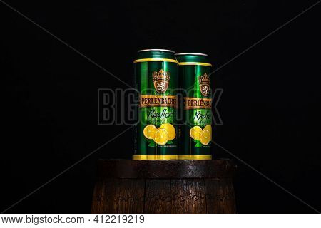 Can Of Perlenbacher Radler Beer On Beer Barrel With Dark Background. Illustrative Editorial Photo Sh