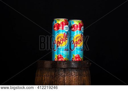 Can Of Ursus Cooler Beer On Beer Barrel With Dark Background. Illustrative Editorial Photo Shot In B