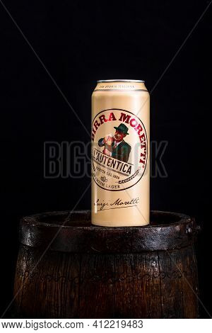 Can Of Birra Moretti Beer On Wooden Barrel With Dark Background. Illustrative Editorial Photo Buchar
