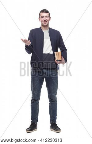 young man with a stack of books . isolated on a white