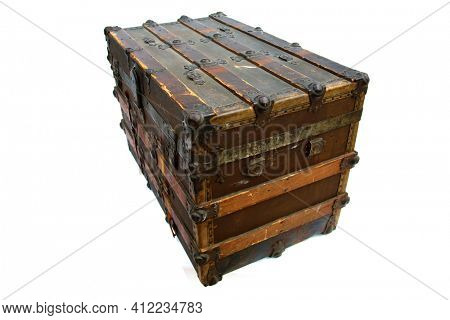 Steamer Trunk.Antique Steamer Trunk. Isolated on white. Steamer Trunks have been used as luggage for years to protect and move clothes and items while traveling the country or the world.
