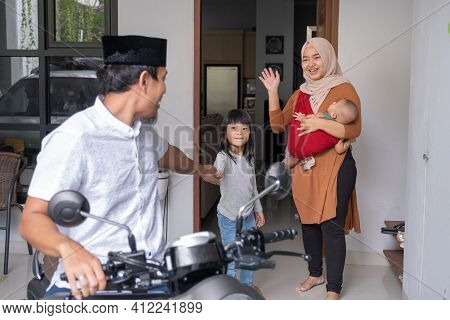 Muslim Man Going By Motorcycle Scooter Leaving His Family Behind At Home