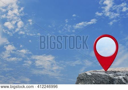 Map Pin Location Button On Rock Mountain Over Blue Sky With White Clouds, Map Pointer Navigation Con
