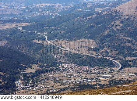 Top View Of The Abruzzo Region In Central Italy And The Wide Highway In The Middle Of The Valley