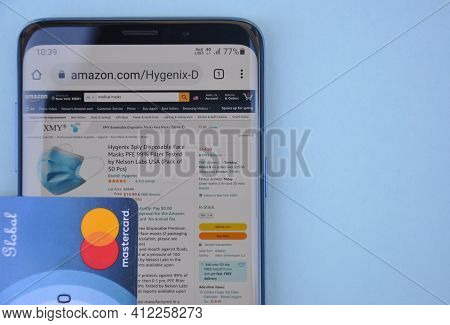 Mandi, Himachal Pradesh, India - 03 04 2021: High Angle Of Buying Medical Mask Online With Mastercar