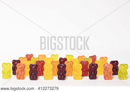 Colourful Sweet Gummy Bears Isolated On White Background.