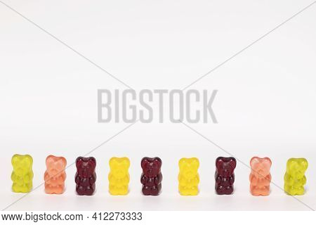 Colourful Sweet Gummy Bears Isolated On White Background.