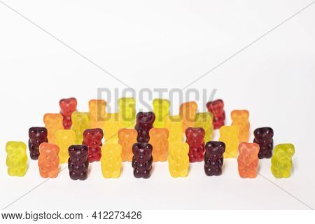 Colourful Sweet Gummy Bears Isolated On White Background.