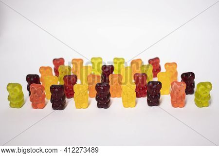 Colourful Sweet Gummy Bears Isolated On White Background.