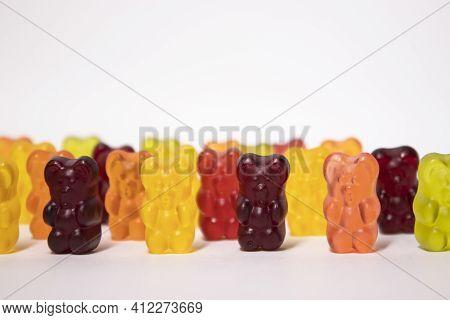 Colourful Sweet Gummy Bears Isolated On White Background.
