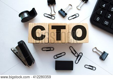 A Word Cto On Wooden Cubes. Business Concept. Business And Finance