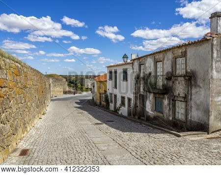 Almeida, Guarda, Portugal; August 2020: Entance And Fragment Of The Fortified Medieval Walls Of The 