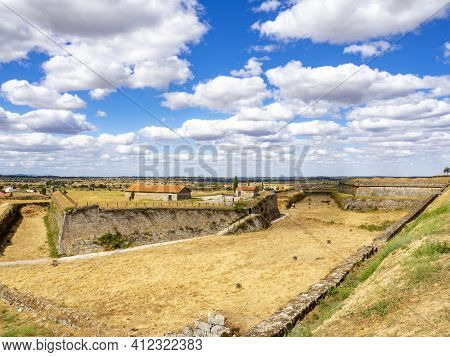 Almeida, Guarda, Portugal; August 2020: Entance And Fragment Of The Fortified Medieval Walls Of The 