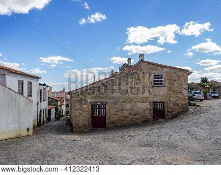 Almeida, Guarda, Portugal; August 2020: Entance And Fragment Of The Fortified Medieval Walls Of The 