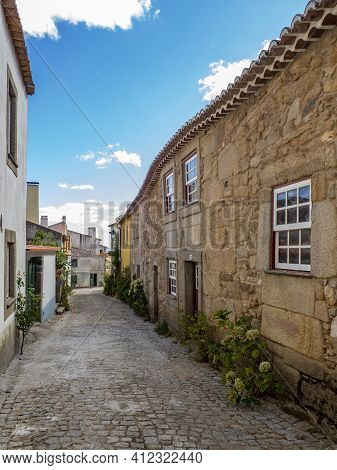 Almeida, Guarda, Portugal; August 2020: Entance And Fragment Of The Fortified Medieval Walls Of The 