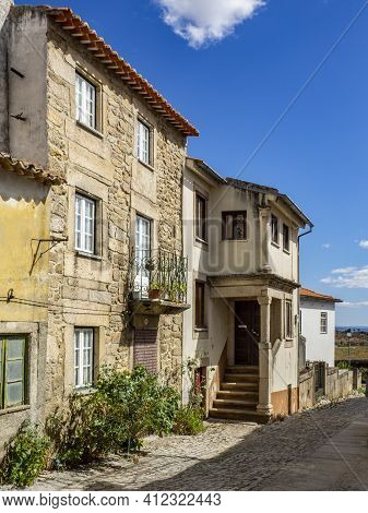 Almeida, Guarda, Portugal; August 2020: Entance And Fragment Of The Fortified Medieval Walls Of The 