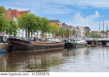 Zwolle, The Netherlands - May 30 2014: Cityscape Dutch Medieval City Zwolle With Canal And Old Moore