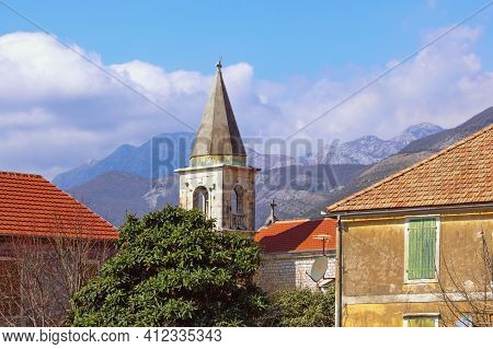 Mediterranean Village: Red Tiled Roofs  And Bell Tower Against Sky And Mountains. Montenegro, Tivat,